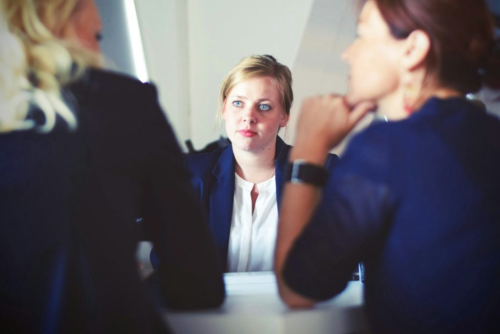 Three women in conversation